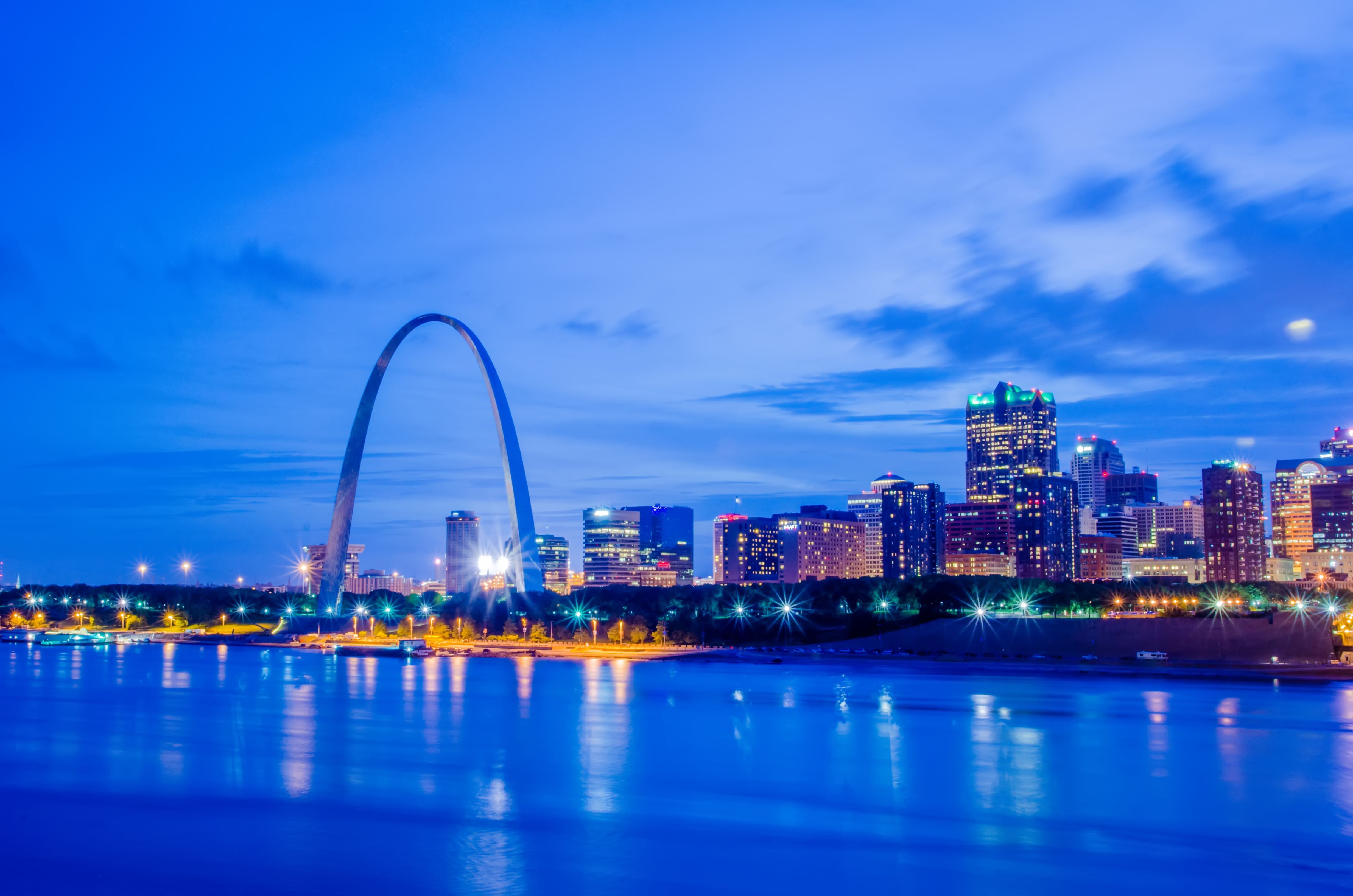 City of St. Louis skyline. St. Louis downtown with Gateway Arch at twilight.